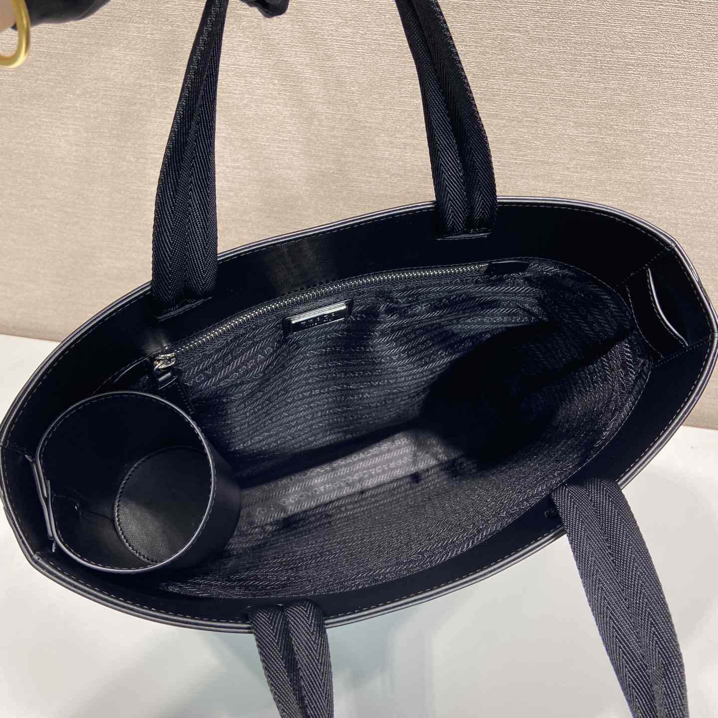 Prada Brushed Leather Tote Bag With Water Bottle - 