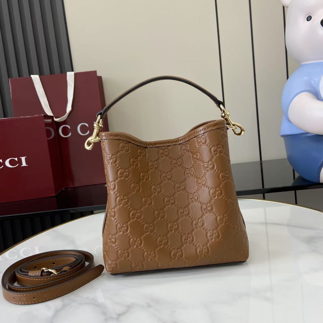 Gucci GG Emblem Small Bucket Bag  - DesignerGu