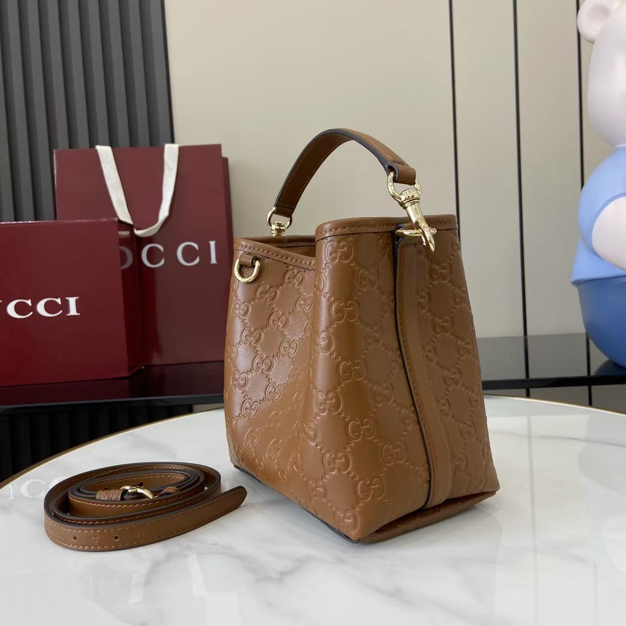 Gucci GG Emblem Small Bucket Bag  - DesignerGu
