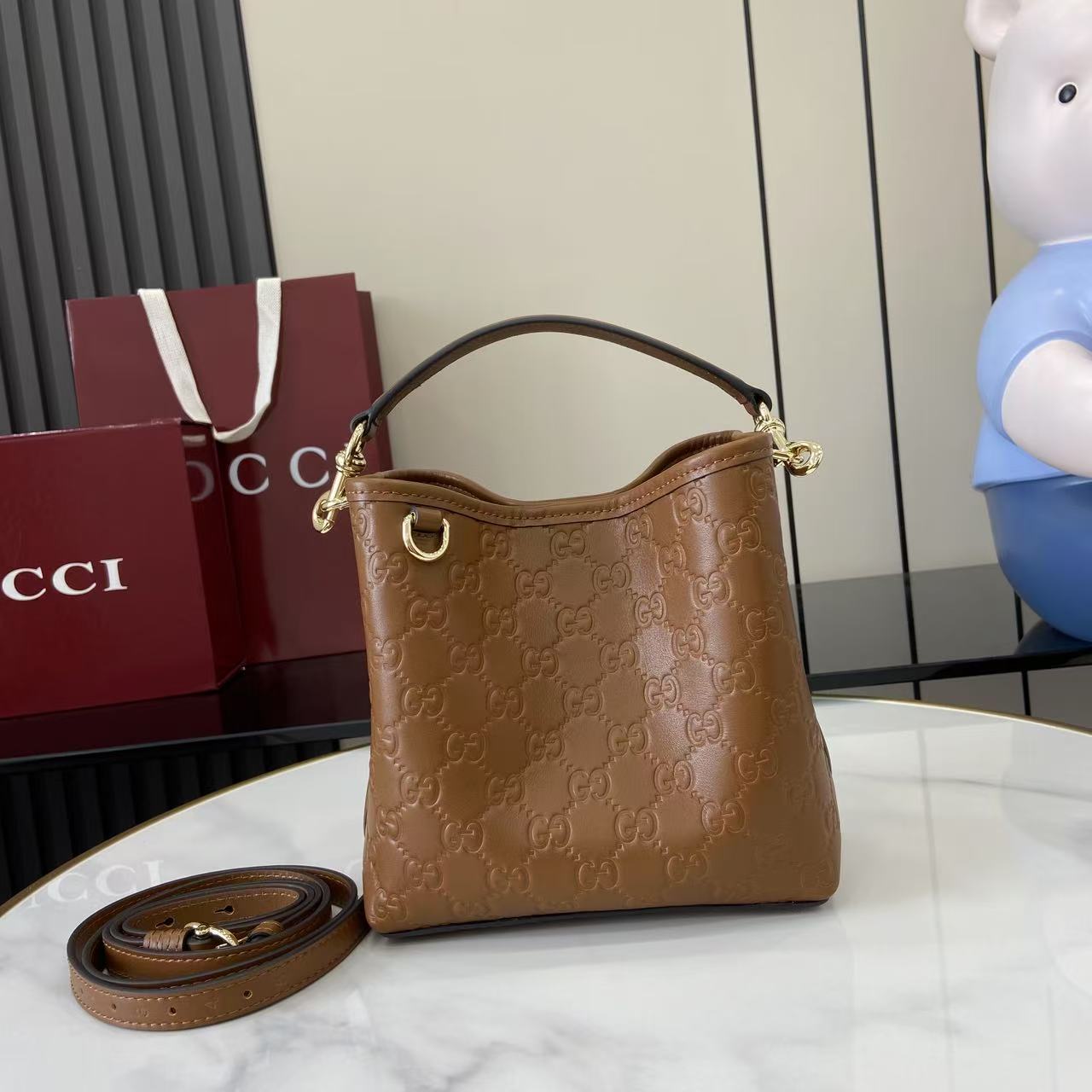 Gucci GG Emblem Small Bucket Bag  - DesignerGu
