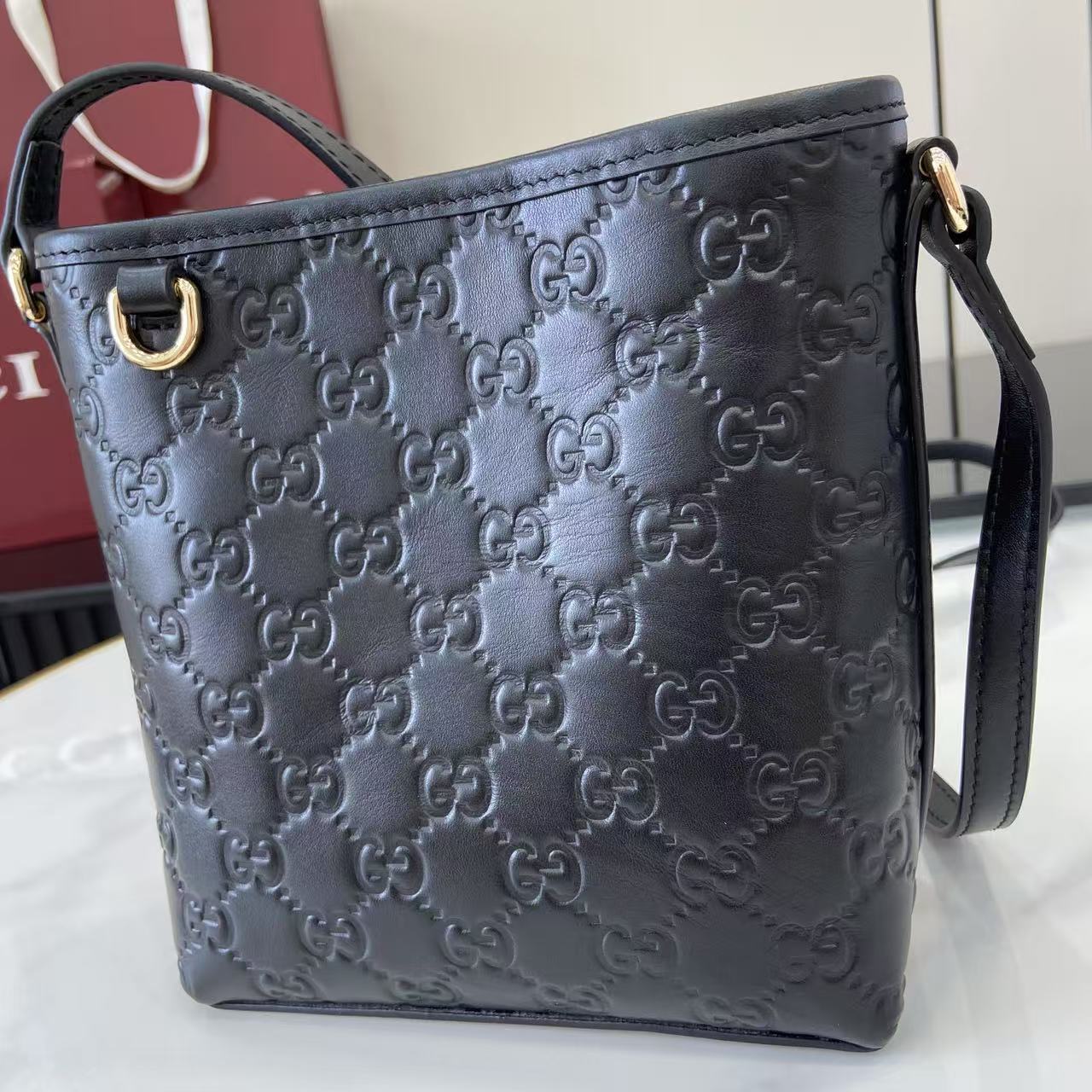 Gucci GG Emblem Nano Bucket Bag - DesignerGu