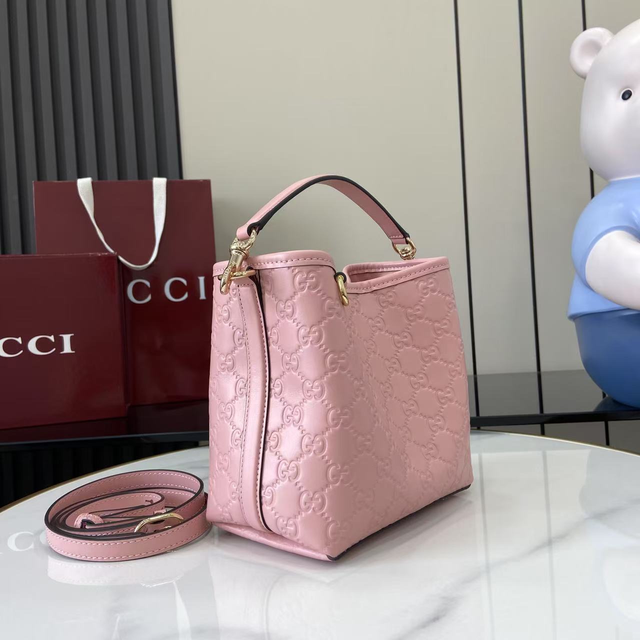 Gucci GG Emblem Nano Bucket Bag - DesignerGu