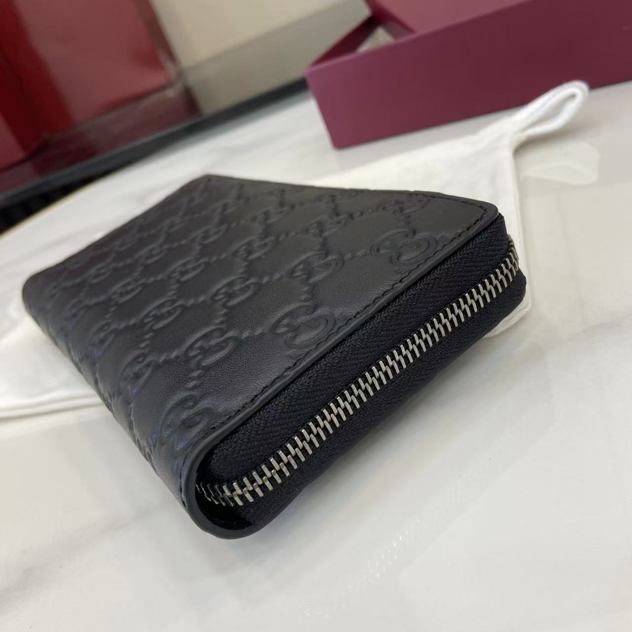 Gucci GG Emblem Zip Around Wallet - DesignerGu