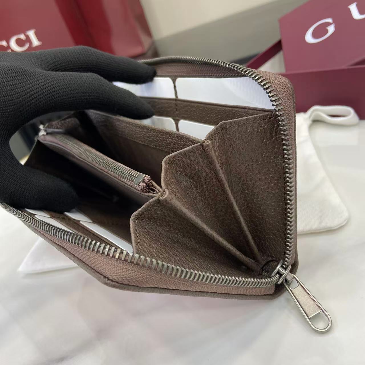 Gucci GG zip-around Wallet - DesignerGu
