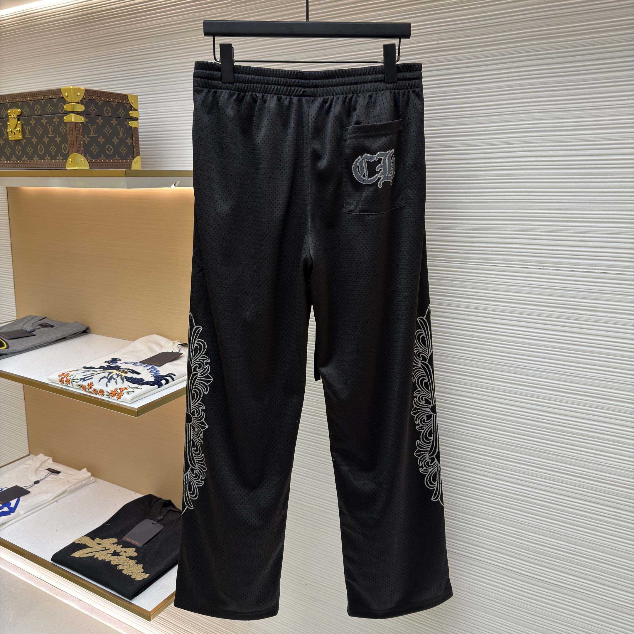 Chrome Hearts black mesh warm-up track pants - DesignerGu